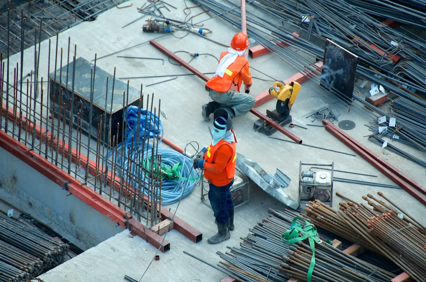 Construction cranes and building development in an emerging market city skyline